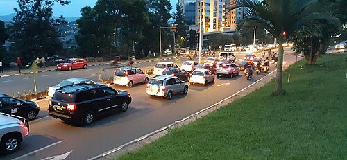 Cars waiting for the red traffic light release at Kiyovu